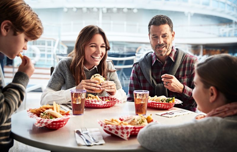 Family eating food on board