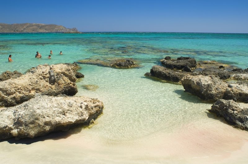 Swimmers in the sea at Elafonisi in western Crete