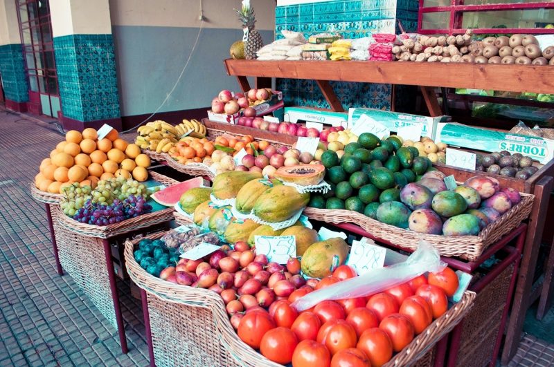 A selection of fresh fruit and vegetables on a stall in Lisbon