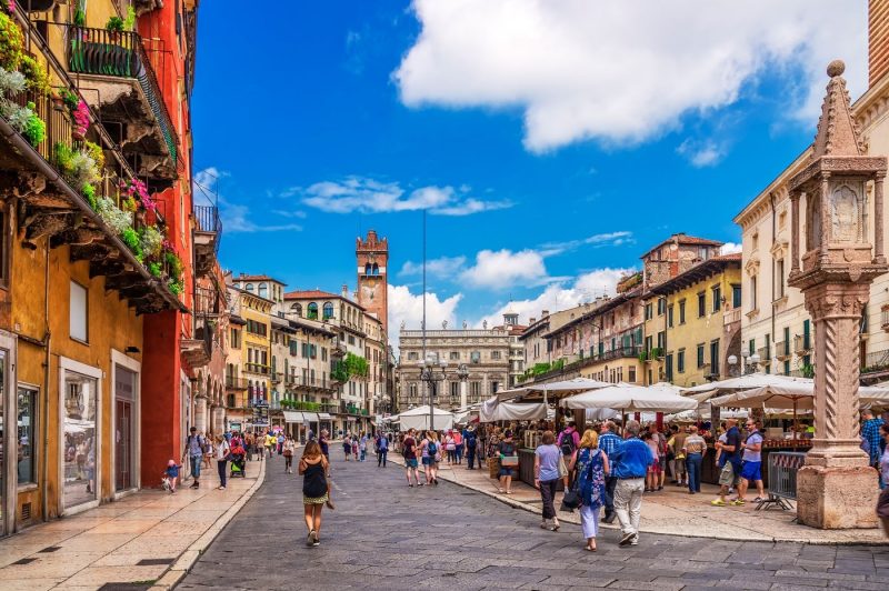 People milling about in the Piazza delle Erbe in Verona