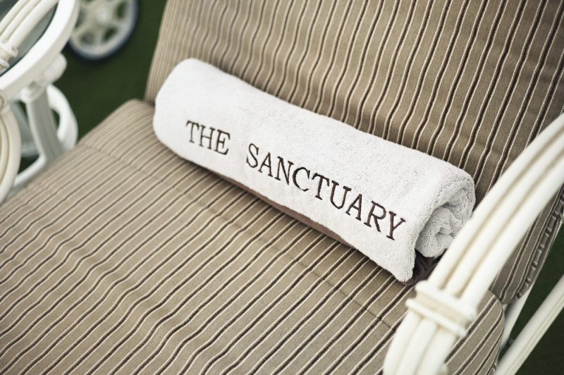 Princess' Sanctuary spa towel on a lounger