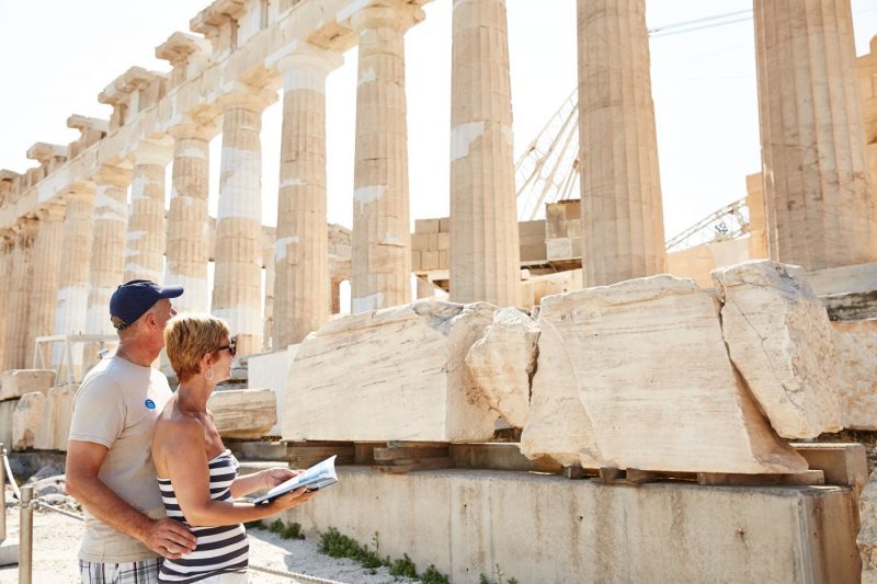 A couple enjoying a view of the Acropolis in Athens