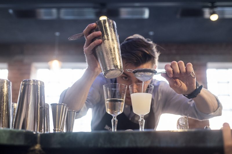 Man making gin cocktail at Bombay Sapphire