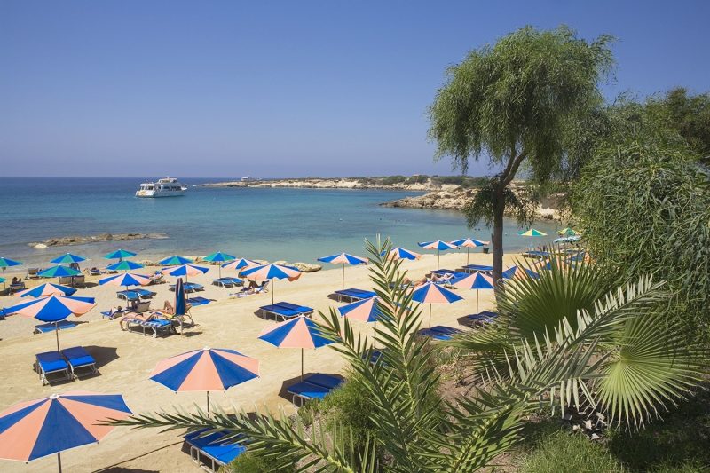 People on beach in Coral Bay, Cyprus