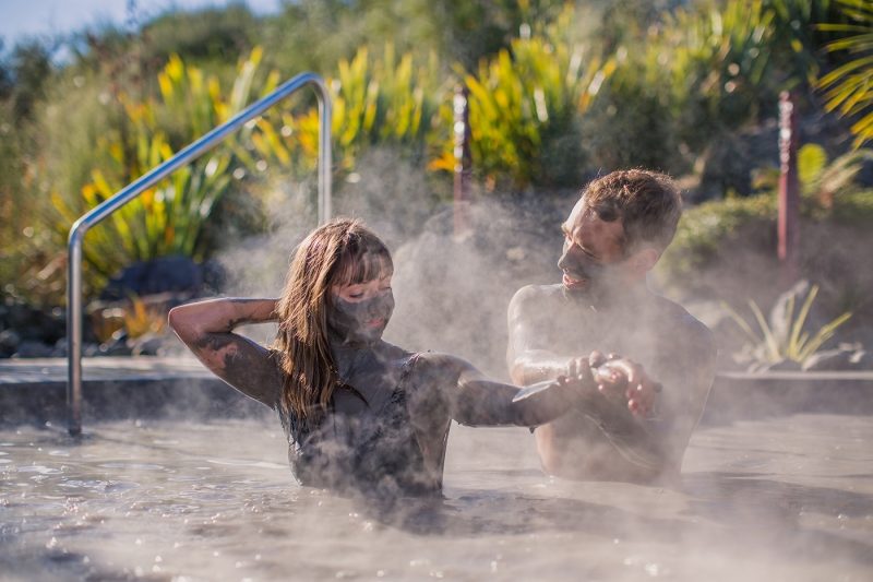 Couple in Hell’s Gate geothermal mud baths