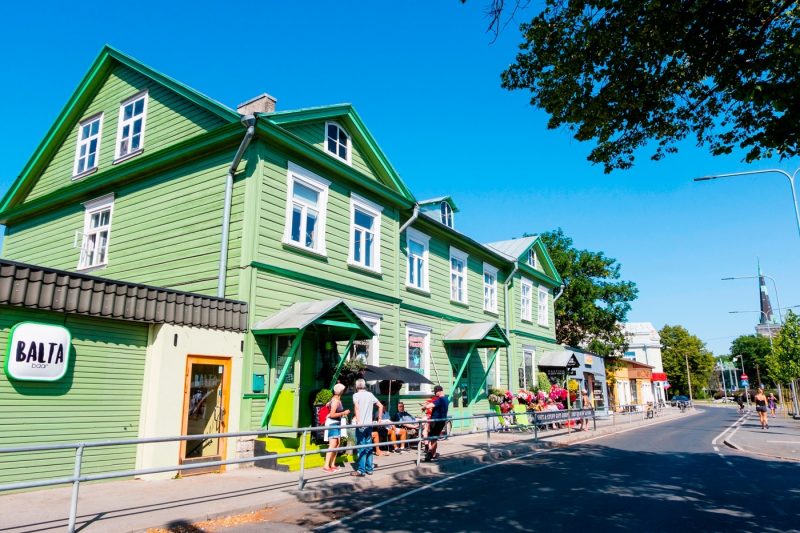 A street scene with brightly coloured buildings in Kalamaja, Tallin