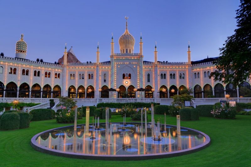 The Nimb building in the Tivoli Gardens, Copenhagen at dusk with fairy lights