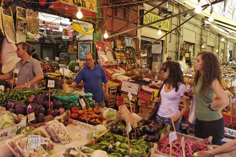 Fruit and vegetable seller in Palermo market