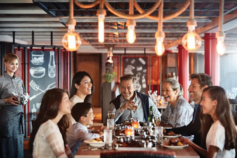 Family sat at dining table