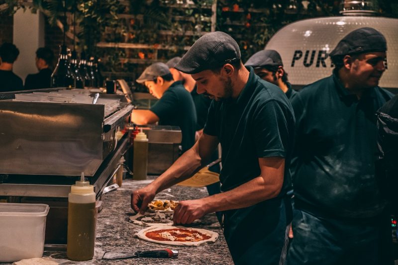 Pizza chef making pizza at Purezza