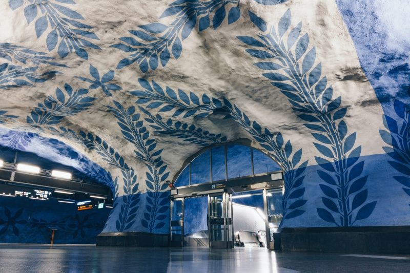 Blue and white leaf pattern art as seen on the Swedish Metro