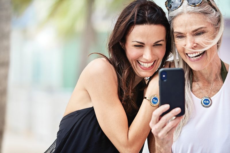 Two women looking at phone