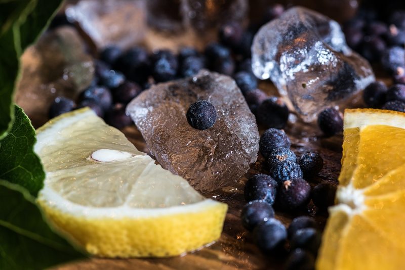 Gin making, Juniper berries, ice, lemon