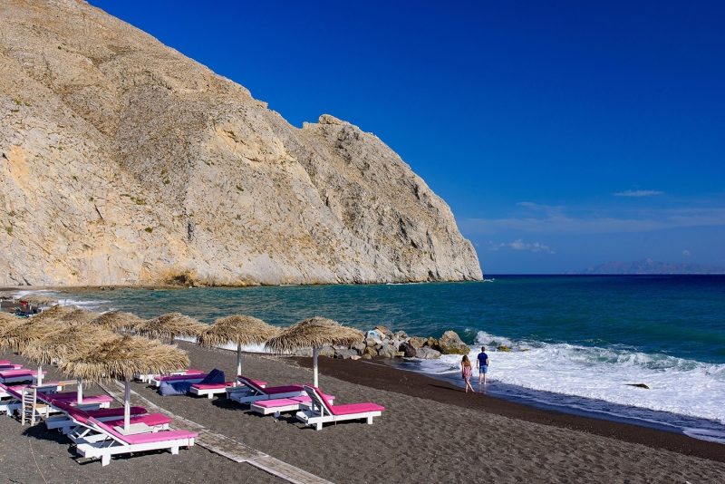 Couple on Perissa Beach Santorini