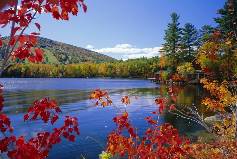 Fall colours, Moose Pond, with Mount Pleasant in the background, Maine, New England, USA