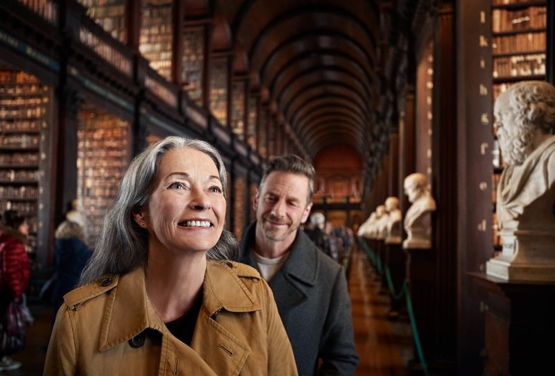 Couple enjoying Trinity College library