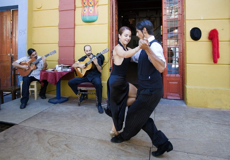 Couple dancing in La Boca district of Buenos Aires