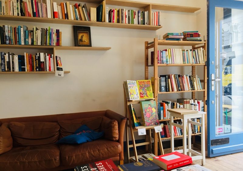 Bookshop with shelves, and a sofa