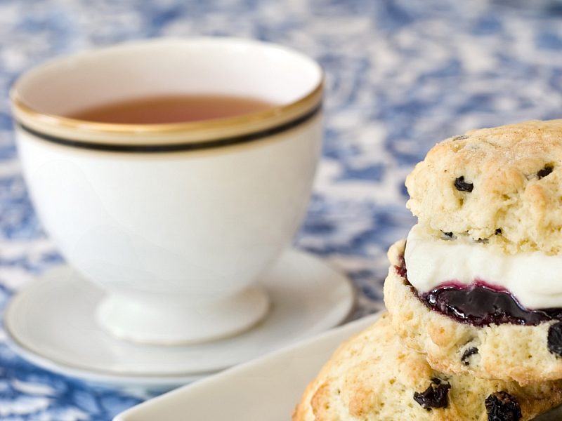 Tea and scone with clotted cream and jam