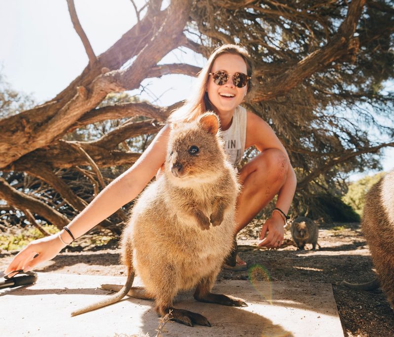 Girl posing with Quokka in Perth