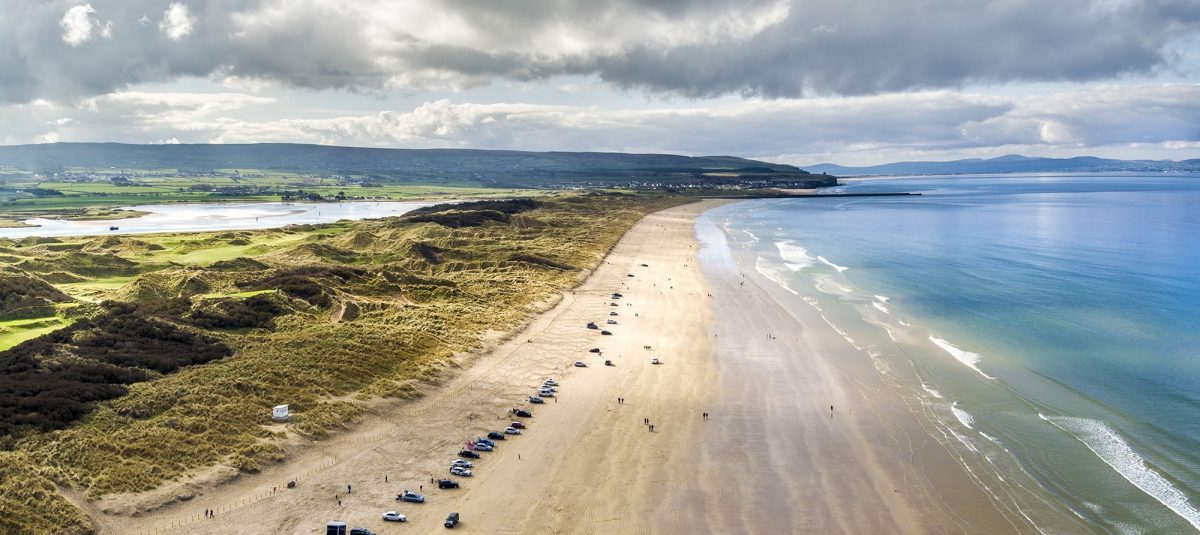 Portstewart Strand with golf course in distance