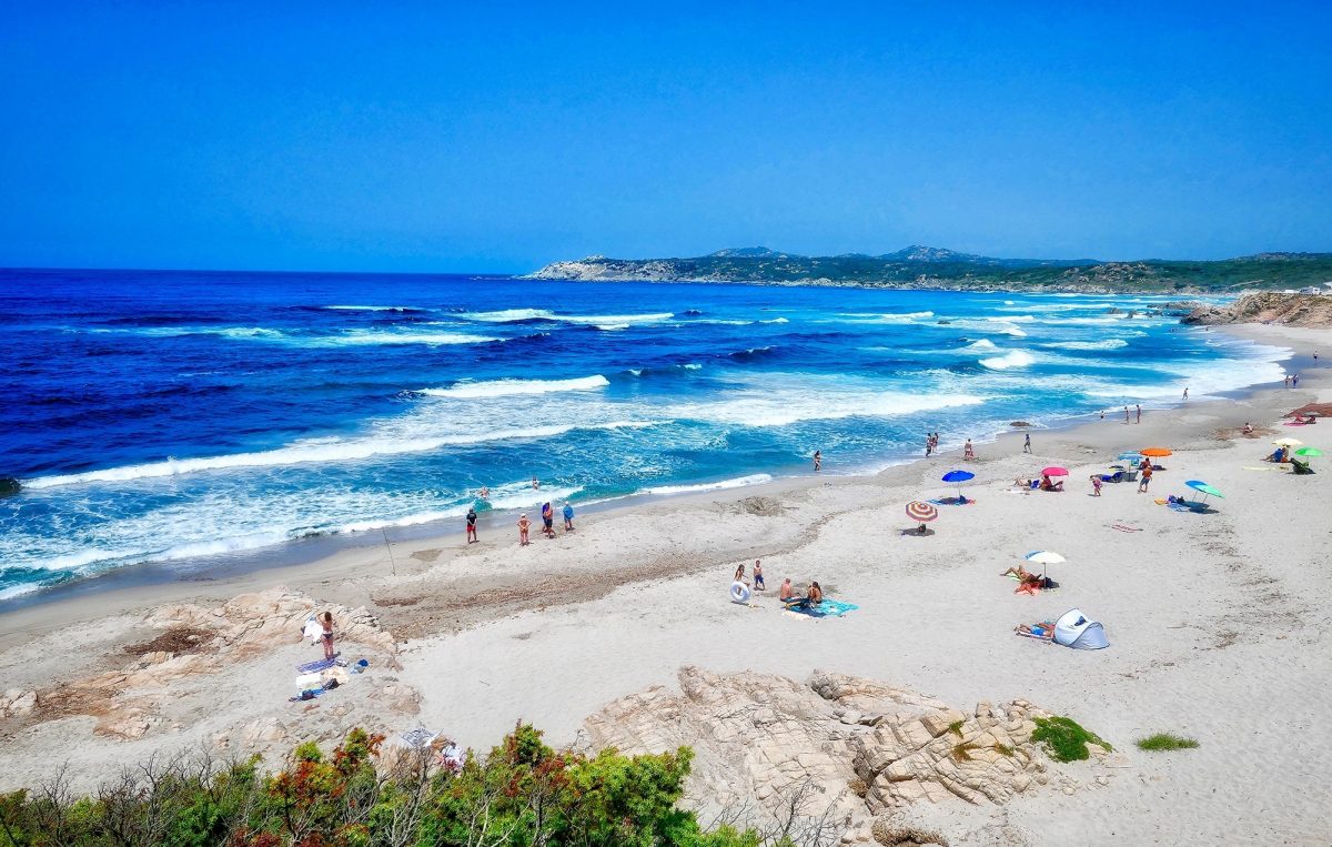 People on beach in Sardinia