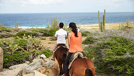 Couple horseriding in Aruba