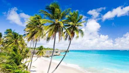 Blue sea and white sandy Barbados beach