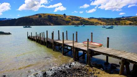 Jetty in water in Akaroa, South Island, New Zealand